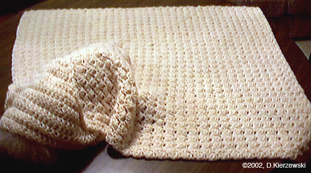 Baby blanket done in Antique White Pound of Love by Lion Brand